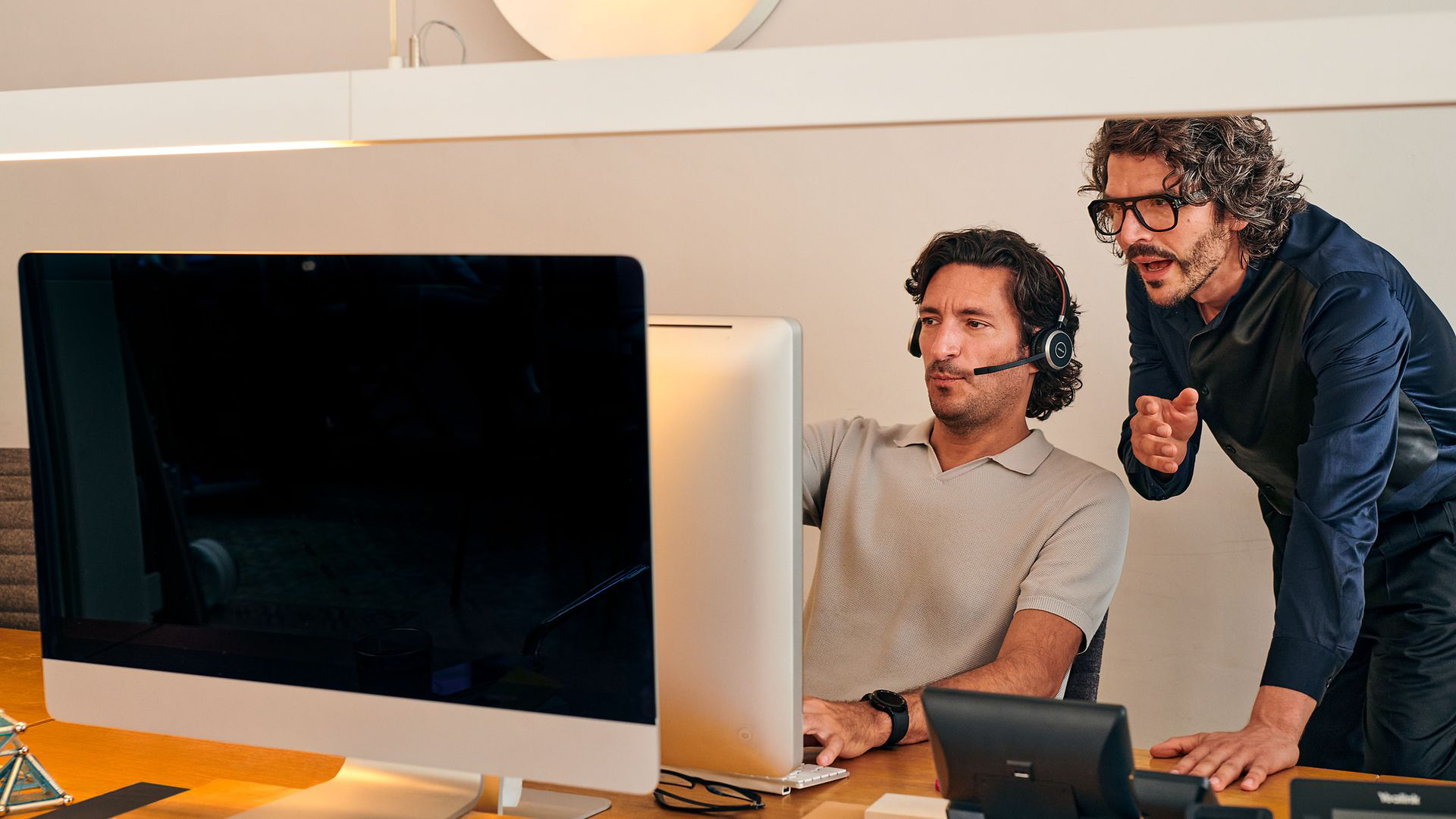Obrázok zobrazujúci pracovníkov v call centre